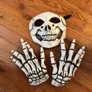 Black hooded cloak with skeleton face and hands